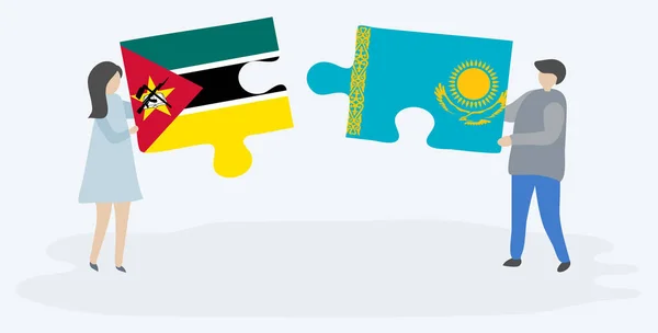 Paar Houden Twee Puzzels Stukken Met Mozambican Kazachse Vlaggen Mozambique — Stockvector