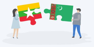 Birmanya ve Türkmen bayrakları ile iki bulmaca parçaları tutan çift. Myanmar ve Türkmenistan ulusal sembolleri birlikte.