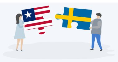 Liberya ve İsveç bayrakları ile iki bulmaca parçaları tutan çift. Liberya ve İsveç ulusal sembolleri birlikte.