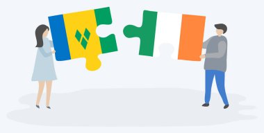 Vincentian ve İrlanda bayrakları ile iki bulmaca parçaları tutan çift. Saint Vincent ve Grenadinler ve İrlanda ulusal sembolleri birlikte.