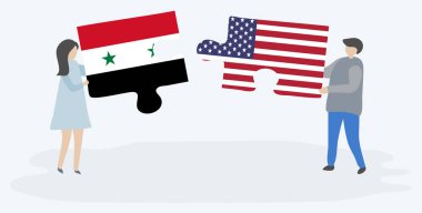 Suriye ve Amerikan bayrakları ile iki bulmaca parçaları tutan çift. Suriye ve Amerika Birleşik Devletleri ulusal sembolleri birlikte.
