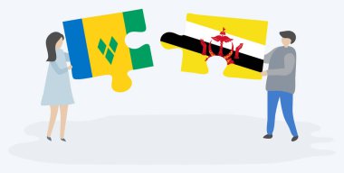 Vincentian ve Bruneian bayrakları ile iki bulmaca parçaları tutan çift. Saint Vincent ve Grenadinler ve Brunei ulusal sembolleri birlikte.