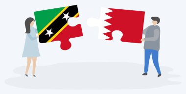 Çift Kittiti ve Bahreyn bayrakları ile iki bulmaca parçaları tutan. Saint Kitts ve Nevis ve Bahreyn ulusal sembolleri birlikte.