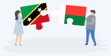Çift Kittitian ve Malagasy bayrakları ile iki bulmaca parçaları tutan. Saint Kitts ve Nevis ve Madagaskar ulusal sembolleri birlikte.