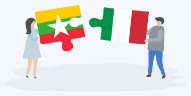 Çift Birmanya ve İtalyan bayrakları ile iki bulmaca parçaları tutan. Myanmar ve İtalya ulusal sembolleri birlikte.