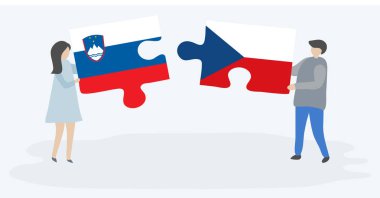 Sloven ve Çek bayrakları ile iki bulmaca parçaları tutan çift. Slovenya ve Çek Cumhuriyeti ulusal sembolleri birlikte.