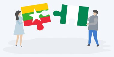 Birmanya ve Nijerya bayrakları ile iki bulmaca parçaları tutan çift. Myanmar ve Nijerya ulusal sembolleri birlikte.