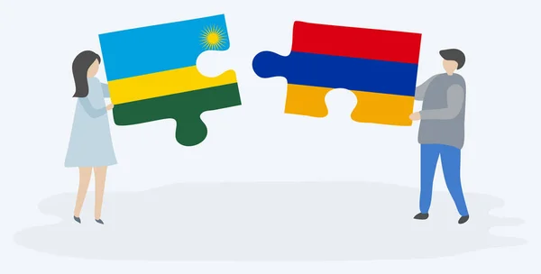 ルワンダとアルメニアの旗を持つ2つのパズルのピースを保持しているカップル ルワンダとアルメニアのシンボル — ストックベクタ