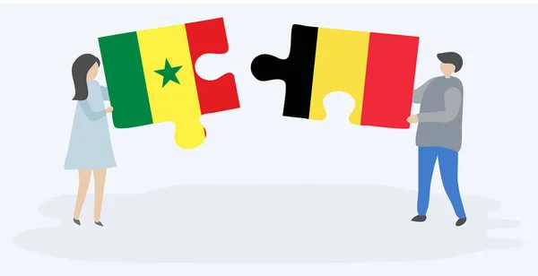 Pareja Sosteniendo Dos Piezas Rompecabezas Con Banderas Senegalesas Belgas Senegal — Vector de stock