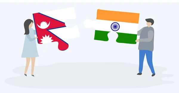 Couple Tenant Deux Pièces Puzzles Avec Des Drapeaux Népalais Indiens — Image vectorielle