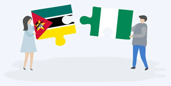 Couple Tenant Deux Pièces Puzzles Avec Des Drapeaux Mozambicains Nigérians — Image vectorielle