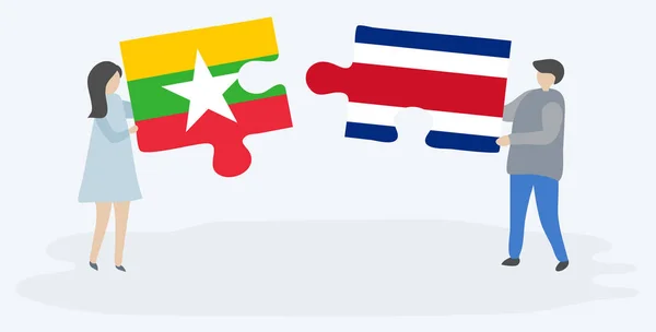 Ζευγάρι Που Κρατά Δύο Κομμάτια Παζλ Σημαίες Βιρμανίας Και Κόστα — Διανυσματικό Αρχείο