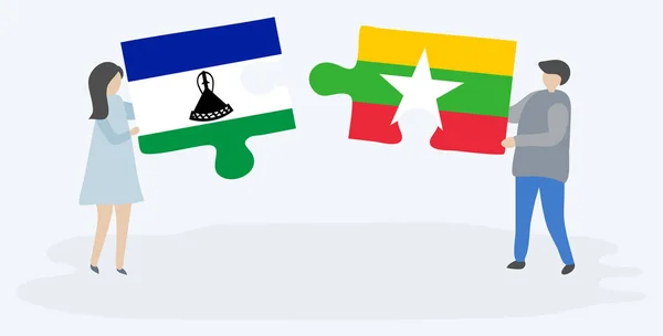 Dvojice Drží Dvě Skládanky Svými Vlajkami Basotho Barmské Vlajky Lesotho — Stockový vektor