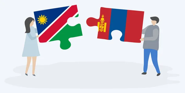 Pareja Sosteniendo Dos Piezas Rompecabezas Con Banderas Namibia Mongolia Namibia — Vector de stock
