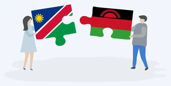 Pareja Sosteniendo Dos Piezas Rompecabezas Con Banderas Namibia Malawi Namibia — Vector de stock