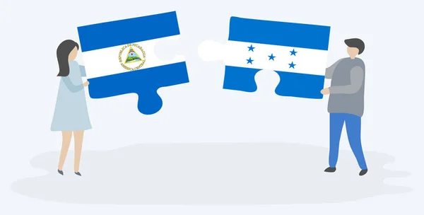 Пара Проведення Двох Головоломок Штук Nicaraguan Гондурасу Прапори Нікарагуа Гондурасу — стоковий вектор