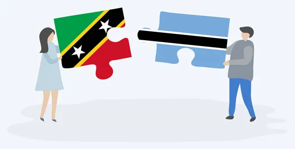 Paar Houden Twee Puzzels Stukken Met Kittitian Motswana Vlaggen Saint — Stockvector