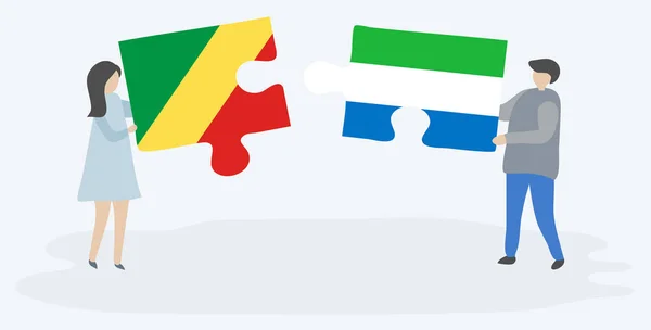 Kongo Sierra Leone Bayrakları Ile Iki Bulmaca Parçaları Tutan Çift — Stok Vektör