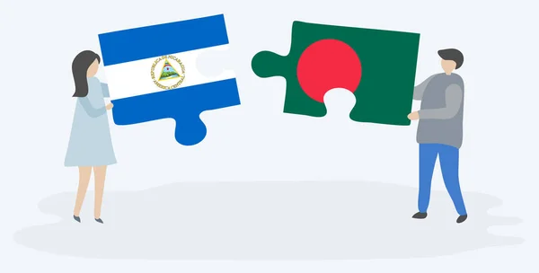 Paar Houden Twee Puzzels Stukken Met Nicaraguaanse Bangladeshi Vlaggen Nicaragua — Stockvector