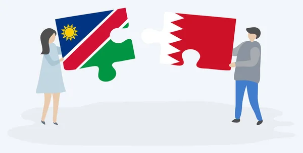 Pareja Sosteniendo Dos Piezas Rompecabezas Con Banderas Namibia Bahrein Namibia — Vector de stock