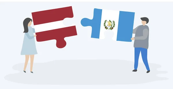 Pareja Sosteniendo Dos Piezas Rompecabezas Con Banderas Letonia Guatemala Letonia — Vector de stock