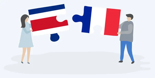 一对夫妇拿着两块拼图 上面挂着哥斯达黎加和法国国旗 哥斯达黎加和法国的国家符号在一起 — 图库矢量图片