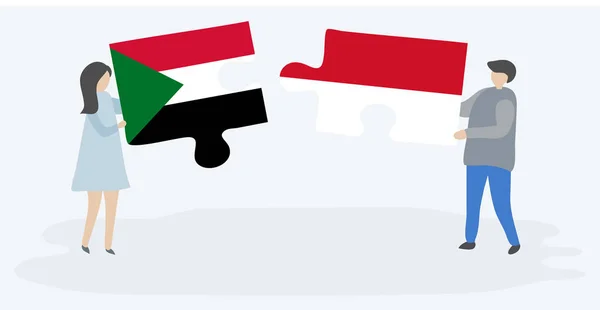 Casal Segurando Duas Peças Quebra Cabeças Com Bandeiras Sudanesas Indonésias — Vetor de Stock