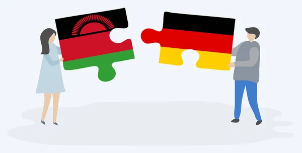 Paar Houden Twee Puzzels Stukken Met Malawische Duitse Vlaggen Malawi — Stockvector