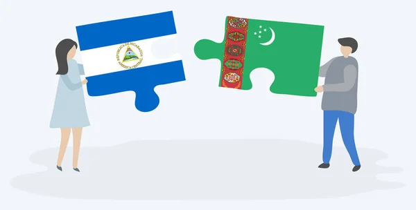 Paar Houden Twee Puzzels Stukken Met Nicaraguaanse Turkmeense Vlaggen Nicaragua — Stockvector