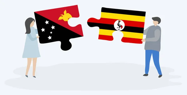 Para Trzyma Dwa Puzzle Kawałki Papuan Ugandy Flagi Symbole Narodowe — Wektor stockowy