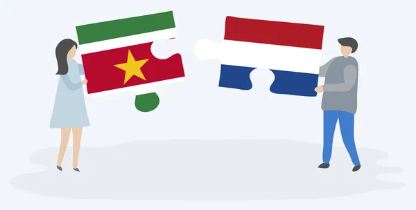 Paar Houden Twee Puzzels Stukken Met Surinaamse Nederlandse Vlaggen Suriname — Stockvector