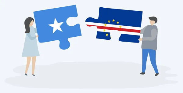 Paar Houden Twee Puzzels Stukken Met Somalische Cabo Verdean Vlaggen — Stockvector