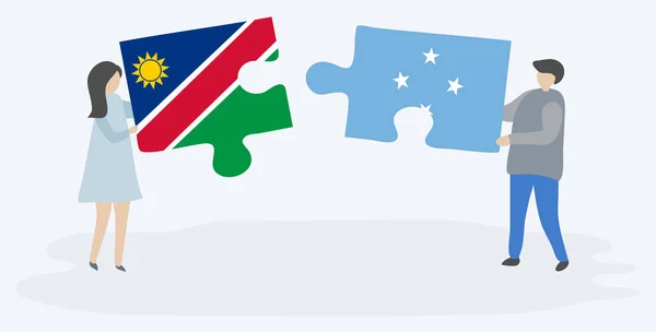 Pareja Sosteniendo Dos Piezas Rompecabezas Con Banderas Namibia Micronesia Namibia — Vector de stock