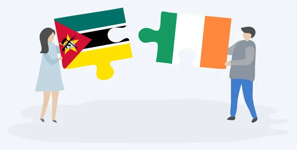 Paar Houden Twee Puzzels Stukken Met Mozambibaanse Ierse Vlaggen Mozambique — Stockvector