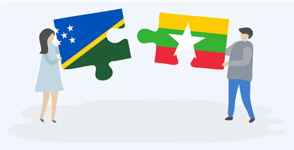 Пара Держащая Две Головоломки Соломоном Бирманскими Флагами Соломоновы Острова Национальные — стоковый вектор