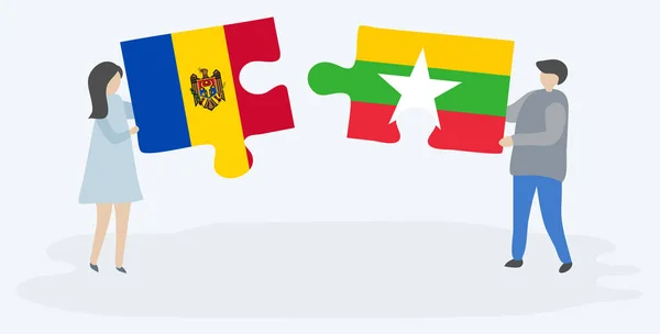 Pareja Sosteniendo Dos Piezas Rompecabezas Con Banderas Moldavas Birmanas Moldavia — Vector de stock