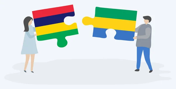 Par Som Innehar Två Pusselbitar Med Mauritiska Och Gabonese Flaggor — Stock vektor