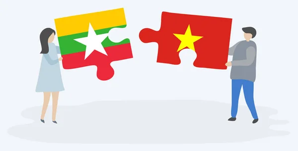 Néhány Holding Két Rejtvények Darab Burmai Vietnami Zászlók Mianmar Vietnam — Stock Vector