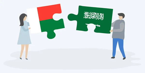 Par Som Innehar Två Pusselbitar Med Madagassiska Och Saudiarabiska Flaggor — Stock vektor