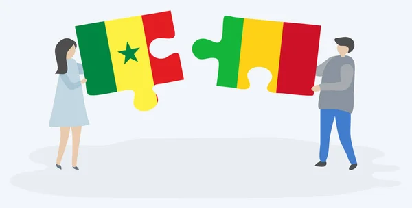 Pareja Sosteniendo Dos Piezas Rompecabezas Con Banderas Senegalesas Malienses Senegal — Archivo Imágenes Vectoriales