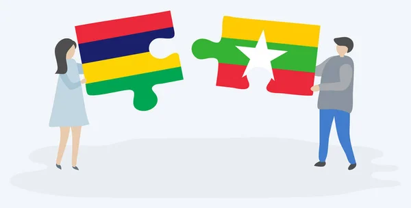 Ζευγάρι Που Κρατά Δύο Κομμάτια Παζλ Σημαίες Μαυρικίου Και Βιρμανίας — Διανυσματικό Αρχείο
