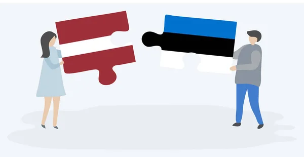 一对夫妇拿着两个拼图片与拉脱维亚和爱沙尼亚国旗 拉脱维亚和爱沙尼亚国家符号在一起 — 图库矢量图片