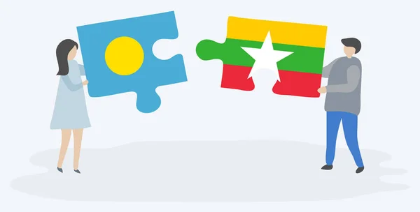 Couple Tenant Deux Pièces Puzzles Avec Des Drapeaux Palauan Birman — Image vectorielle