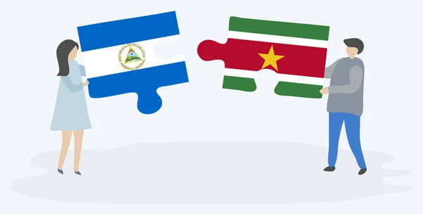 Пара Проведення Двох Головоломок Штук Nicaraguan Суринамський Прапори Нікарагуа Сурінам — стоковий вектор