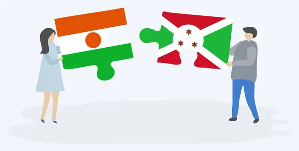 Ζευγάρι Που Κρατά Δύο Κομμάτια Παζλ Σημαίες Νιγηριέν Και Μπουρούντι — Διανυσματικό Αρχείο