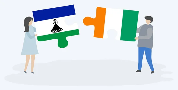 Paar Houden Twee Puzzels Stukken Met Basotho Ivoriaanse Vlaggen Nationale — Stockvector