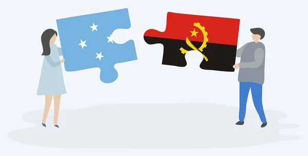 Paar Houden Twee Puzzels Stukken Met Micronesian Angolese Vlaggen Micronesia — Stockvector