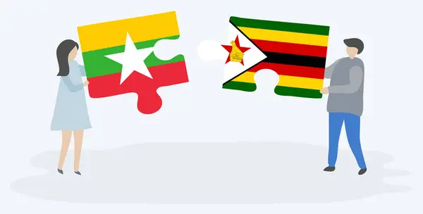 Çift Birmanya Zimbabve Bayrakları Ile Iki Bulmaca Parçaları Tutan Myanmar — Stok Vektör