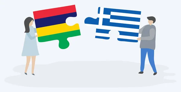 Ζευγάρι Που Κρατά Δύο Κομμάτια Παζλ Σημαίες Μαυρικίου Και Ελληνικές — Διανυσματικό Αρχείο