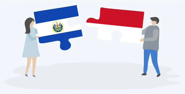 Couple Tenant Deux Pièces Puzzles Avec Des Drapeaux Salvadoriens Monégasques — Image vectorielle